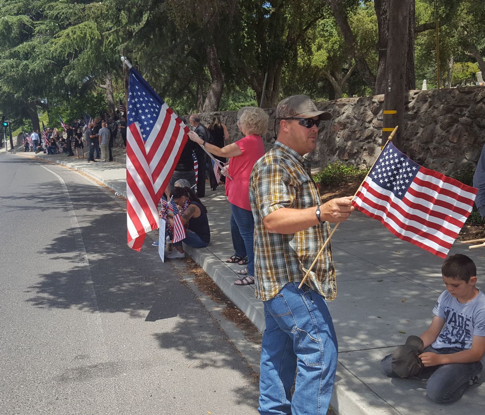 Napans lining up on Coombsville Road for Cory Miele's motorcade